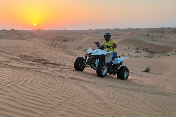 1 hour Quad Biking Experience with pick and drop - Riding Into the Deep Desert Near Sweihan