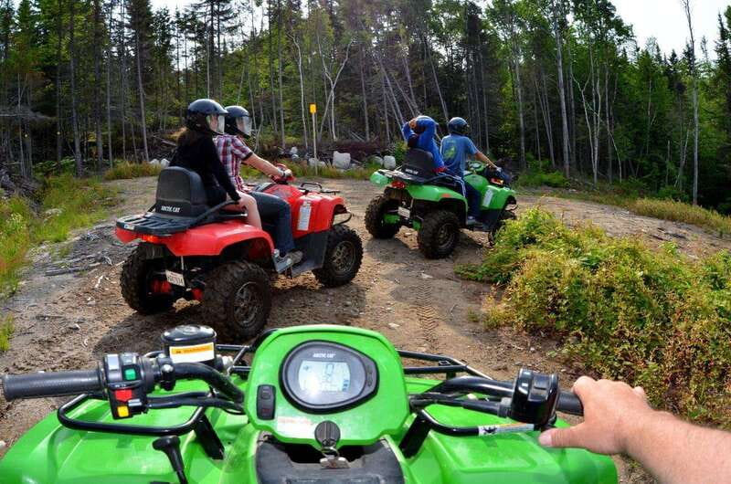 15 min. Tadoussac : Guided ATV tour excursion - Forest trails, hills, and technical sections