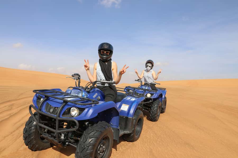 Abu Dhabi: Desert Safari, Quad Bike, Camels & Sandboarding - Quad biking is the hands-on thrill