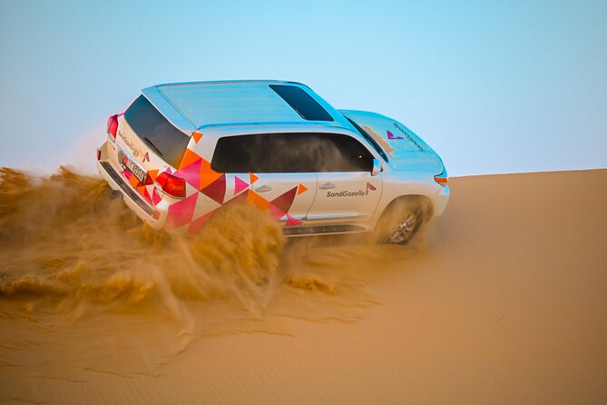 Abu Dhabi Evening Desert Safari - Private car Dune bashing & BBQ - Sandboarding and the quietest desert pause