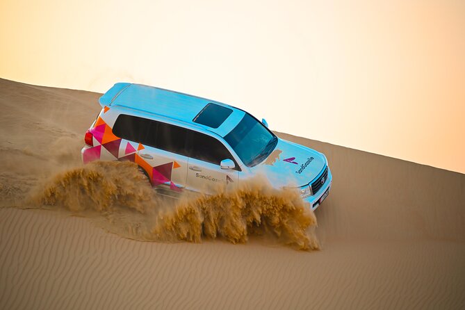 Abu Dhabi Evening Desert Safari - Private car Dune bashing & BBQ - Dune bashing in a private 4x4