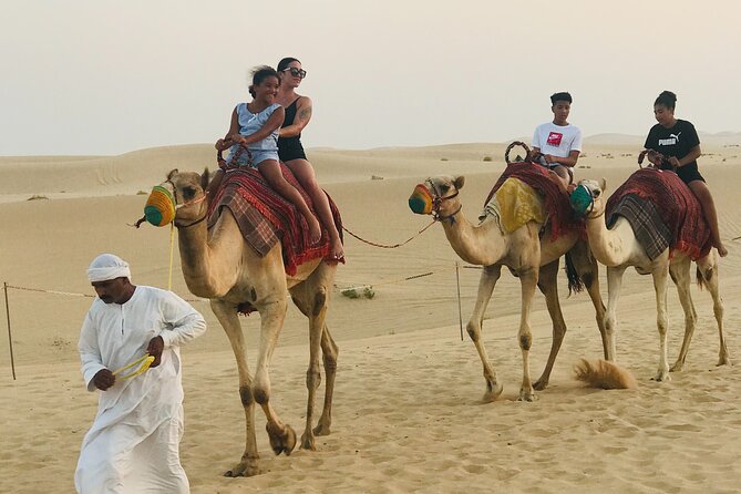 Abu Dhabi Morning Desert Safari,Dune Bashing,Sandboarding,Camel Riding&Quad Bike - Camel riding gives the safari a slower moment