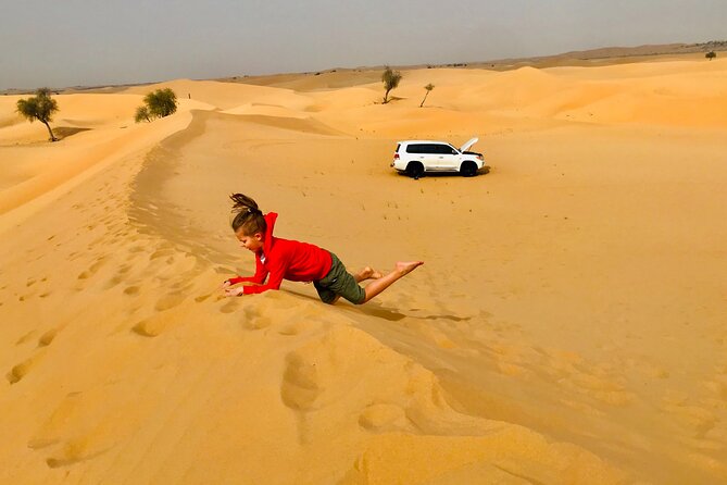 Abu Dhabi Morning Desert Safari,Dune Bashing,Sandboarding,Camel Riding&Quad Bike - A campsite stop ties the activities together