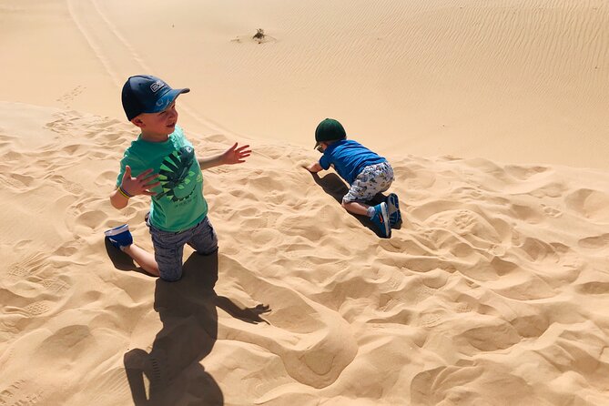 Abu Dhabi Morning Desert Safari,Dune Bashing,Sandboarding,Camel Riding&Quad Bike - Guides matter more than the brochure