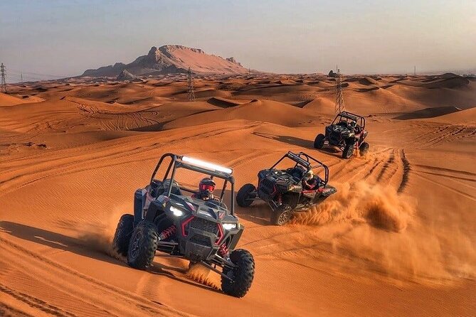 Adventurous Red Dune Desert Safari Deal with Quad Bike,Shows &BBQ - Red dunes, roaring engines, and a busy six-hour evening
