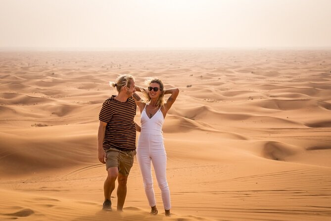 Adventurous Red Dune Desert Safari Deal with Quad Bike,Shows &BBQ - Eight shows, from belly dance to fire performance
