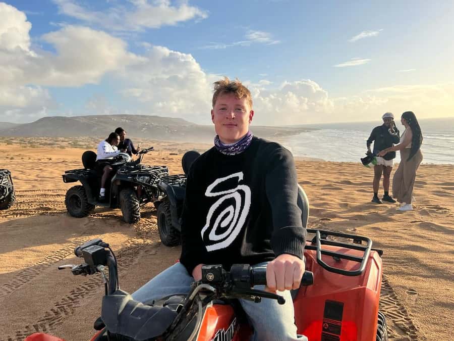 Agadir/Taghazout: Beach Quad Bike & Desert Sandboarding Tour - Sandboarding down the golden dunes