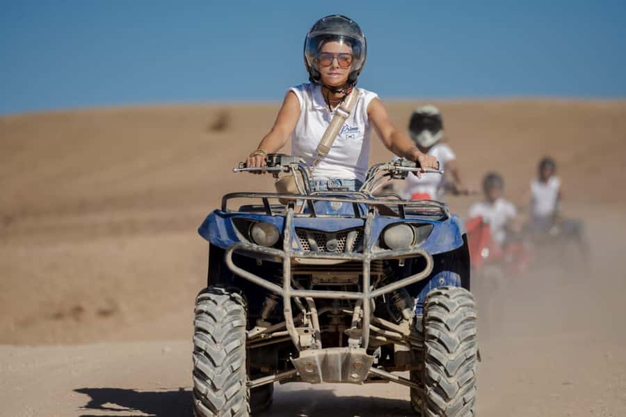 Agafay Desert Tour: Quad, Camel, Lunch & Pool Access - Moroccan lunch at the desert retreat