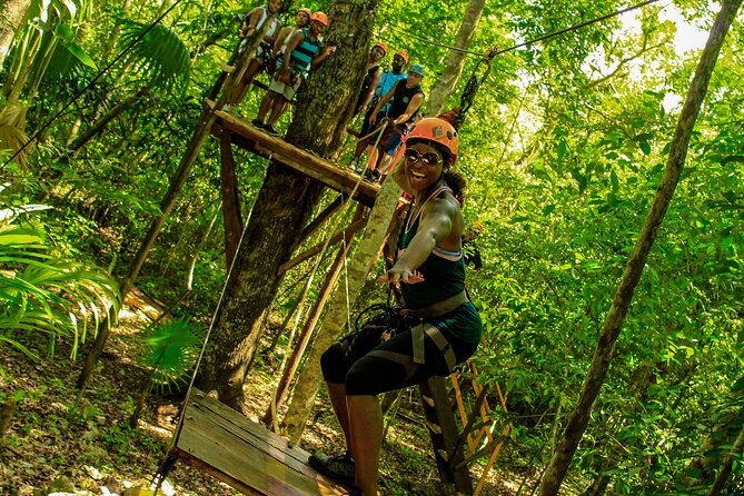 Amazing ATV Tour, Ziplines and Cenote Swim with Lunch and round trip included - Entering the cenote, the calm center of the day