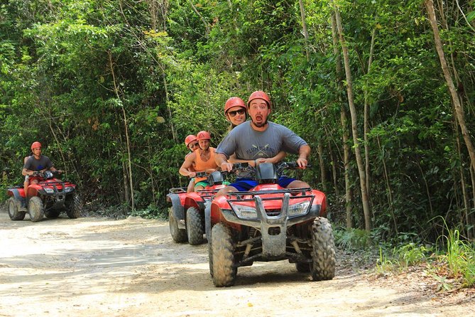 ATV Adventure Combo with Snorkeling, Ziplines, Cenote, and Lunch - ATVs on the jungle challenge road