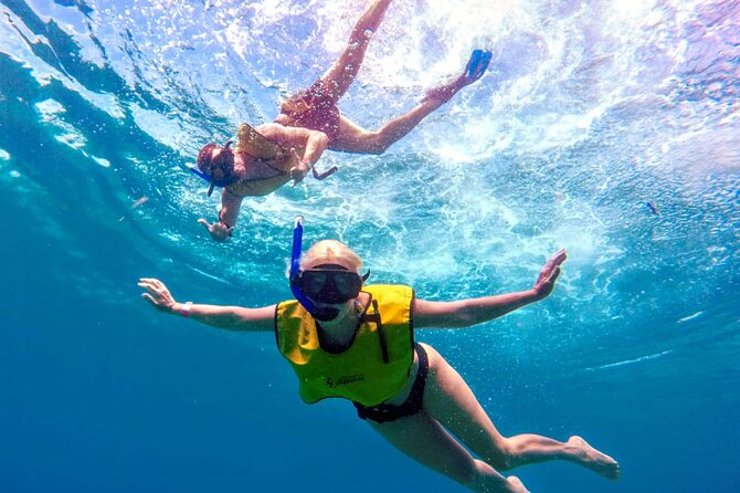 ATV Mud Kicking and Snorkeling by Boat in Cozumel - Lunch, drinks, and water-park time