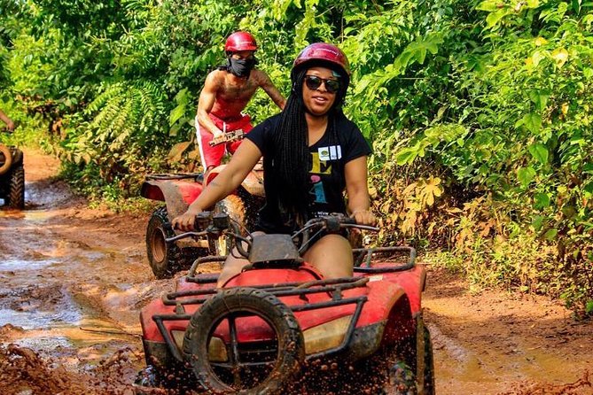 ATV Tour with Cenote swim, Ziplines, Transportation and Lunch Included - ATV riding on a rough, compact course