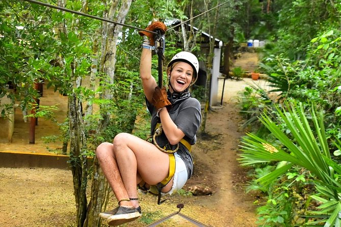ATV, Ziplines and Cenote swim experience from Cancun or Riviera Maya - Riding an ATV through the Puerto Morelos jungle