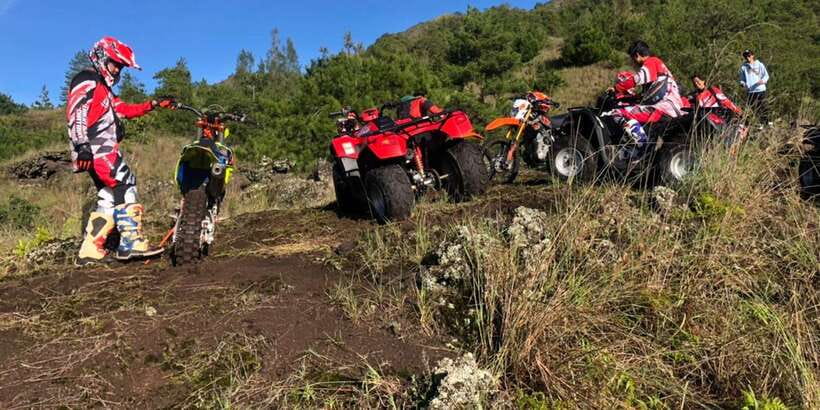 Bali: ATV Batur Sunrise, Lava, Pine Forest and Hot Spring - Riding an ATV through forest and volcanic ground