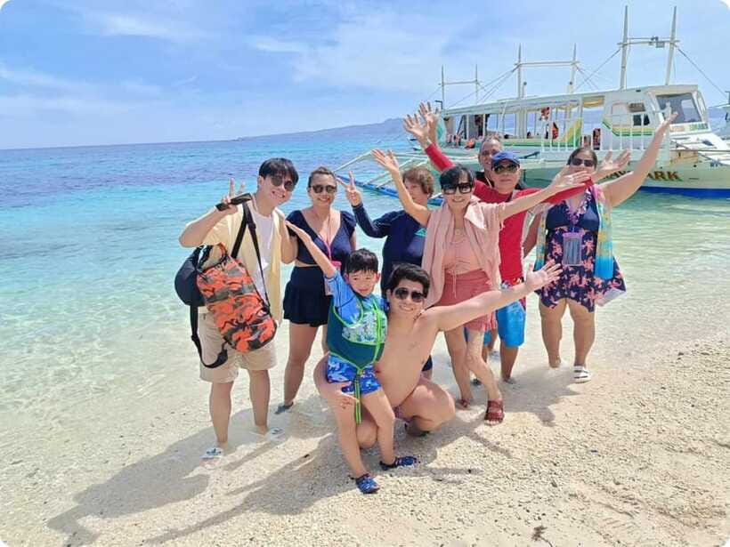 Boracay: Parasailing, Island Hopping, ATV Ride and Kawa Bath - Puka Shell Beach begins the island circuit