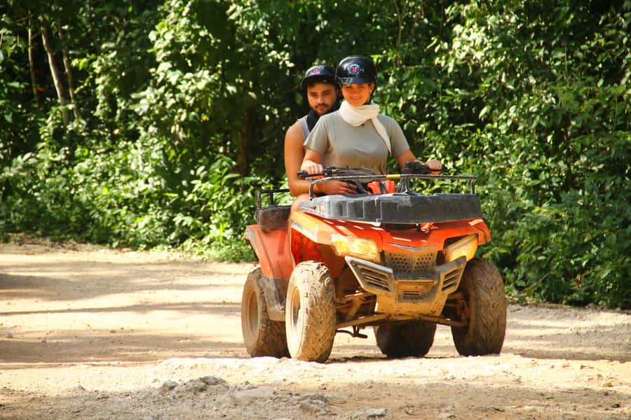 Cancún: ATV, Zipline, and Cenote Adventure with Lunch - Ziplining above the tree line