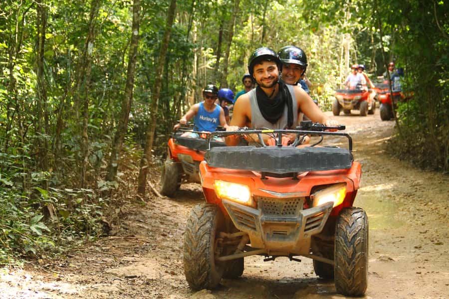 Cancún: ATV, Zipline, and Cenote Adventure with Lunch - ATV trails with mud, turns, and a catch