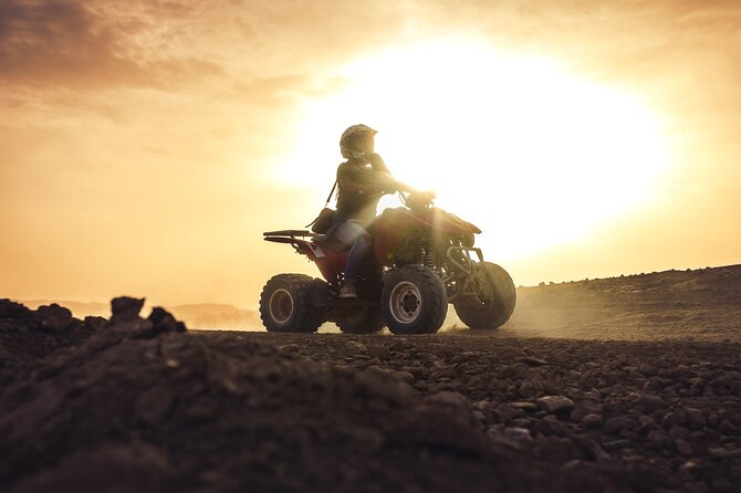 Desert D'Agafay Package - Quad, Dromedary and Dinner Show - Riding a camel as the sun goes down