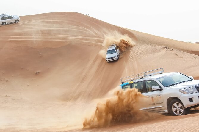 Desert Safari Experience with Dune Bashing and Dinner in Dubai - Dune bashing as the afternoon heat fades
