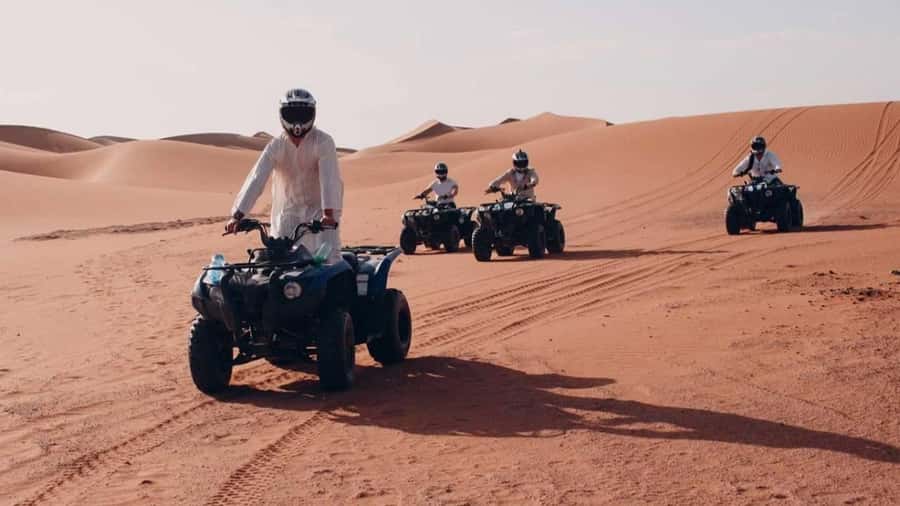 Desert Safari, Quad Bike, Camel Ride, Falcon & Sandboarding - Dune bashing across Qatar’s open sand