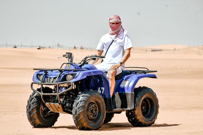 Desert Safari With BBQ Dinner, Quad Bike & Camel Ride from Dubai - Quad biking, sandboarding, and the first camel ride