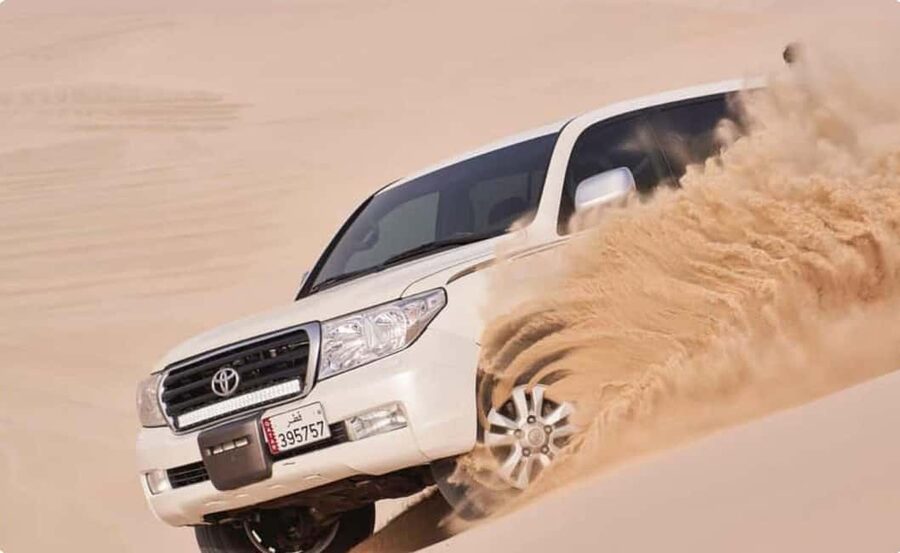 Doha: ATV, Quad or Buggy, Dune Bashing, Camel & Sandboarding - Dune bashing in a 4x4 Land Cruiser