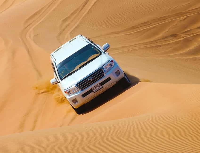 Doha: ATV, Quad or Buggy, Dune Bashing, Camel & Sandboarding - Guides, driving, and the human side of the tour