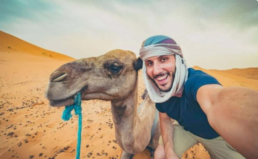 Doha: ATV, Quad or Buggy, Dune Bashing, Camel & Sandboarding - Quad biking across open sand