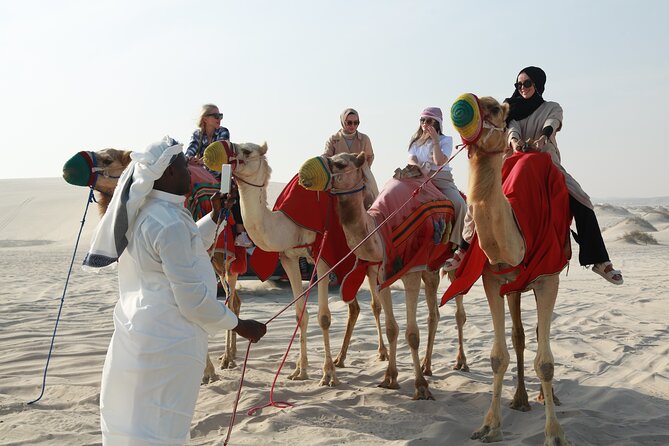 Doha Desert Safari Dune Bashing Camel Ride Sandboarding - The Inland Sea, where dunes run into the Gulf
