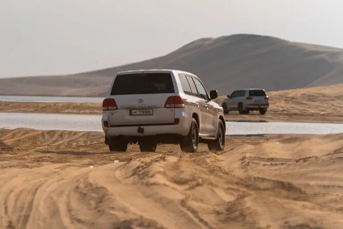 Doha Desert Safari Dune Bashing Camel Ride - Leaving Doha in a private, air-conditioned vehicle