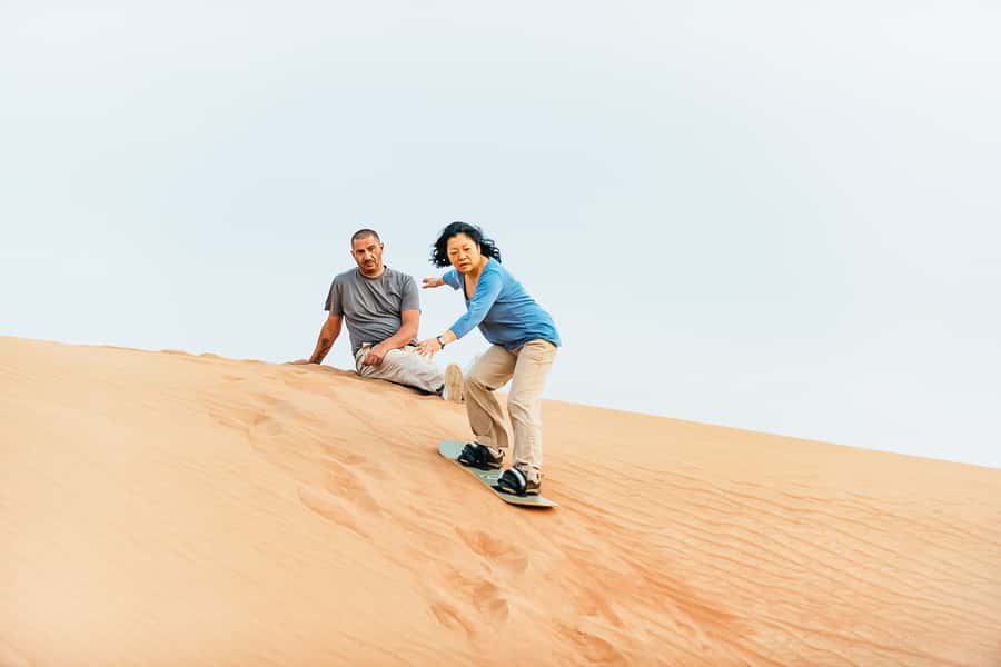 Doha: Desert Safari Dune Bashing, Sandboarding, & Camel Ride - Dune bashing in a professional 4x4