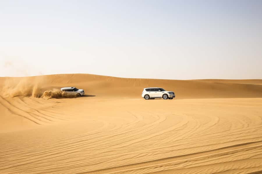Doha: Desert Safari Dune Bashing, Sandboarding, & Camel Ride - The Inland Sea, where the dunes meet Gulf water