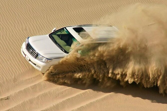 Doha Desert Safari Horse Riding, Camel Ride, ATVs & Inland Sea - An hour on an ATV over the sand