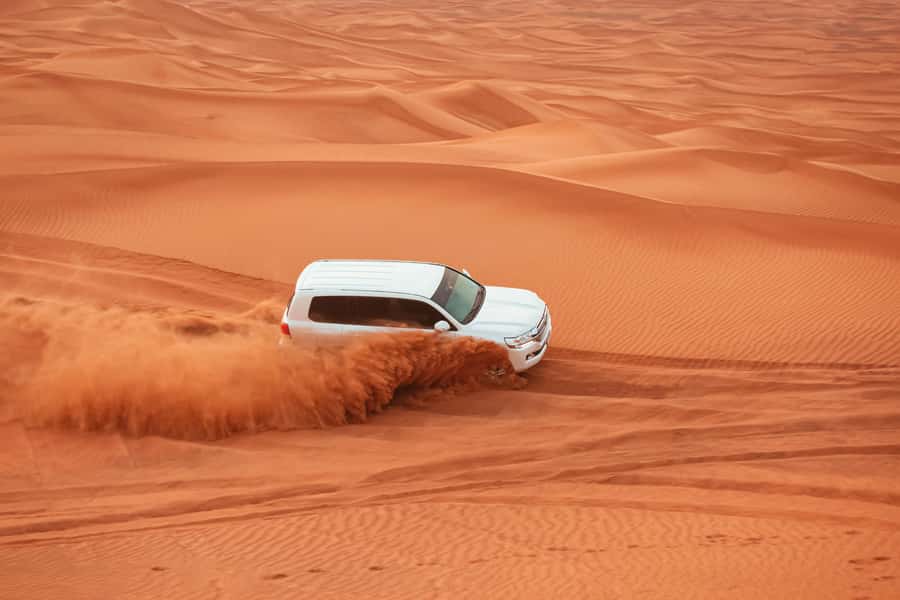 Doha: Desert Safari, Sandboarding, Dune Bashing & Inland Sea - Guides, vehicles, and group style