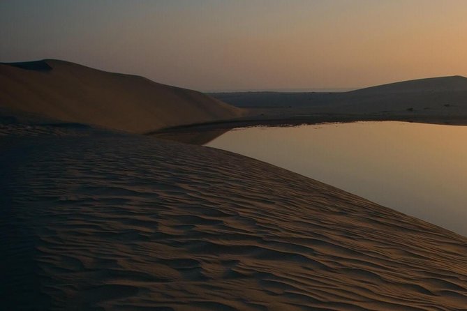 Doha: Desert Safari With Quad bike ,Camel Ride And Sand Boarding - Sandboarding gives you a quieter thrill