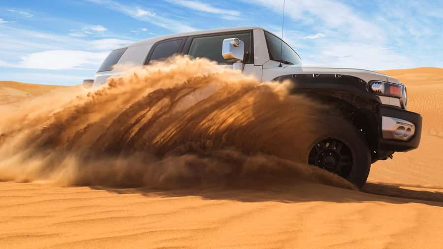 Doha: DesertSafari with Quad Bike, Camel Ride & Sandboarding - Camel stop with tea, coffee, and photo time