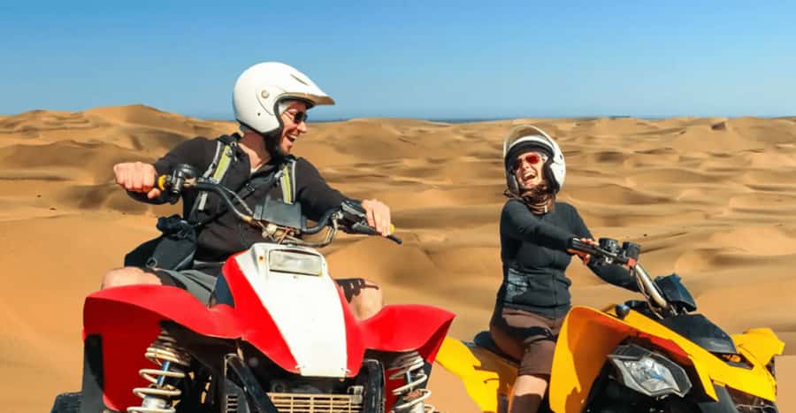 Doha: DesertSafari with Quad Bike, Camel Ride & Sandboarding - Sandboarding on the golden dunes