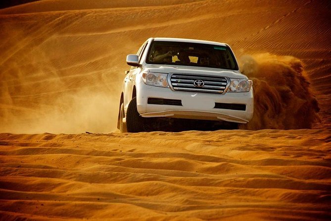 Doha :Half Day Desert Safari | Camel Riding | ATV | Sand Surfing - Leaving Doha for the open sand