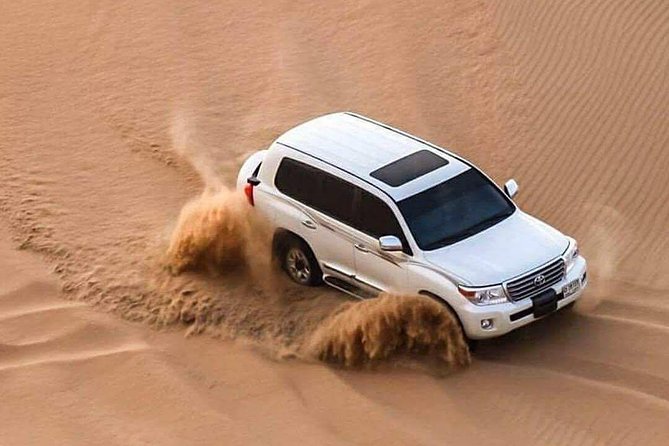 Doha :Half Day Desert Safari | Camel Riding | ATV | Sand Surfing - Dune bashing is the main event
