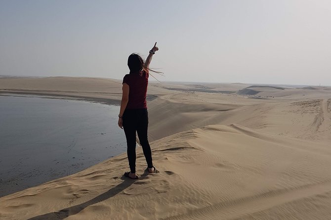 Doha :Half Day Desert Safari | Camel Riding | ATV | Sand Surfing - Khor Al Adaid and the meeting of sand and sea