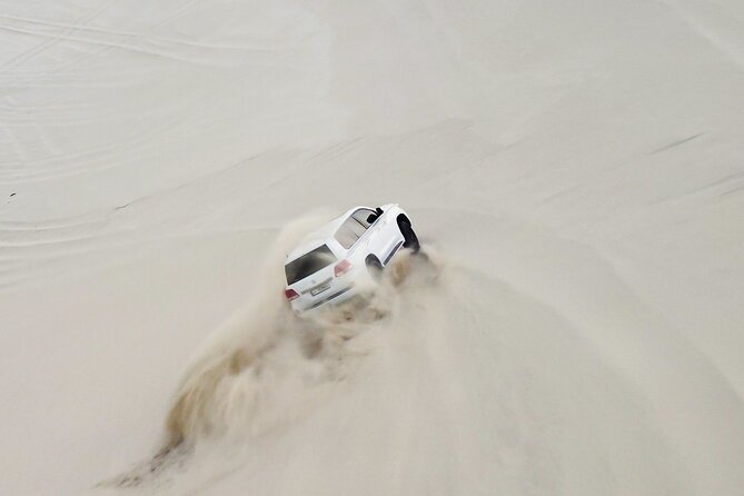 Doha-Half Day Safari with Quad Bike ATV/Camel Ride/sandboard - From Doha to Sealine Beach