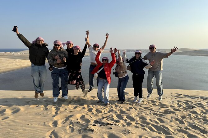 Doha: Luxury Desert Safari, Quad Bike & Sandboarding - Sandboarding on soft desert slopes