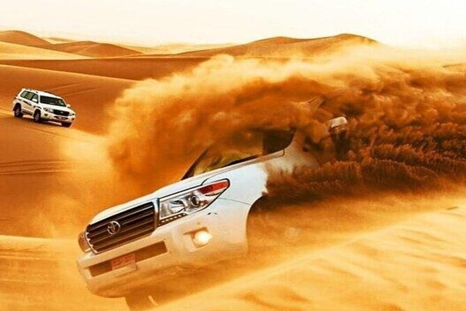 Doha Qatar ATV Quad Bike Buggy Desert Adventure and Camel Ride - Khor Al Adaid, where sand meets the sea