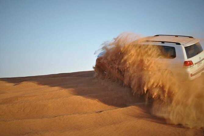 Doha: Quad Bike, Dune Bashing, Camel Ride & Inland Sea Tour - From Doha streets to open desert