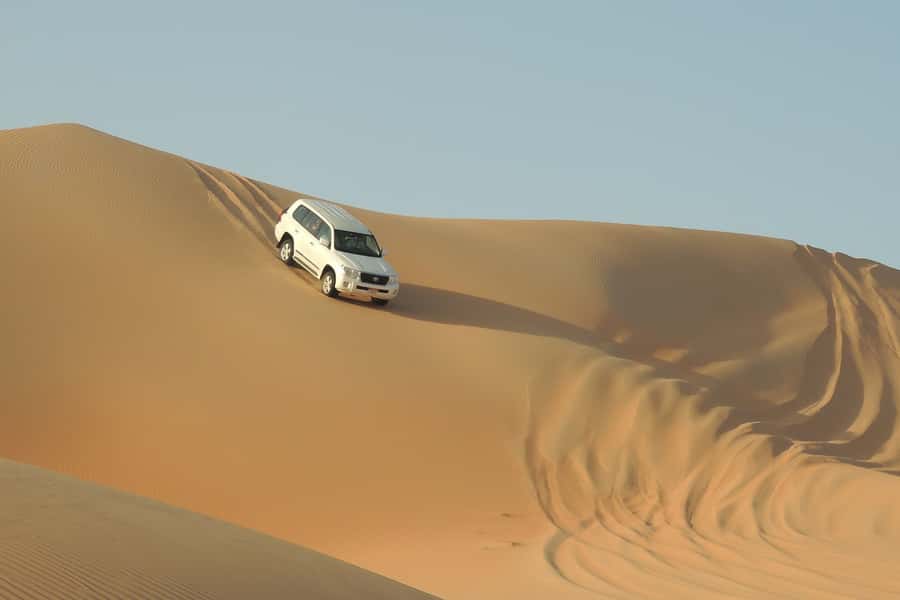 Doha Safari: ATV Ride, Dune Bashing, & Sandboarding Fun - From Doha’s Refineries to Open Desert