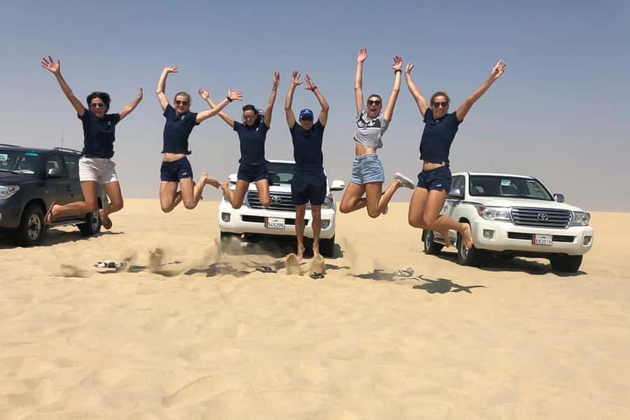 Doha Safari: ATV Ride, Dune Bashing, & Sandboarding Fun - Tea, Camels, and a Short Camp Stop