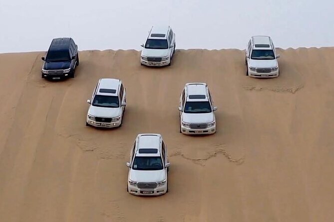 Doha Sharing Desert Safari with Dune Bashing and Sand Boarding - Key points at a glance