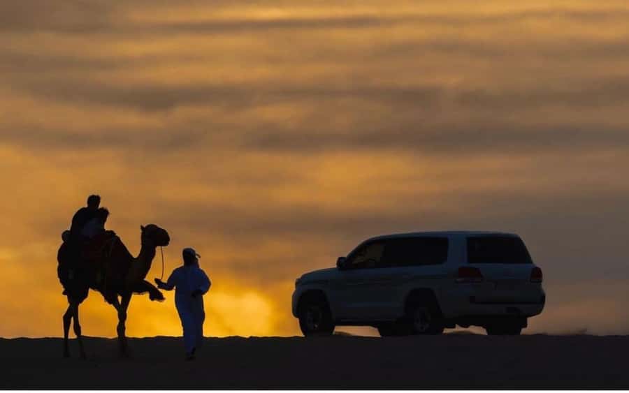 Doha: Stargazing Desert Safari w/ Dune Bashing & Camel Ride - Leaving Doha in a private 4x4