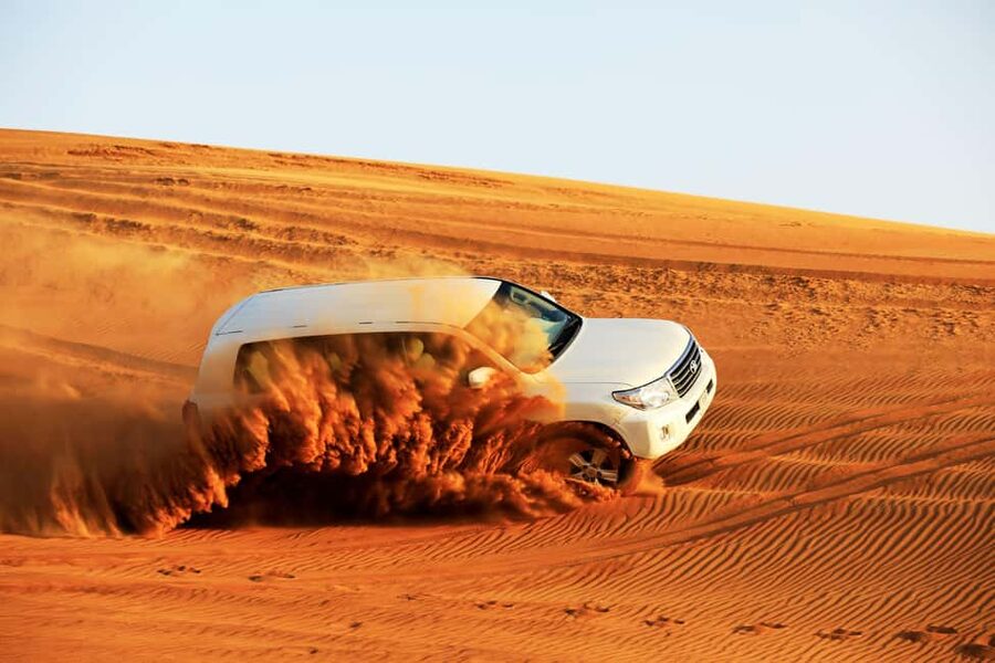Doha: Sunset Desert Safari, ATV, Camel Ride and Sandboarding - Khor Al Adaid and the sunset finish