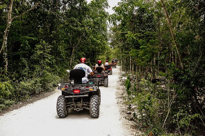 Double Atv Tour In Cozumel And Cenote Jade - Riding the ATVs through mud and dust